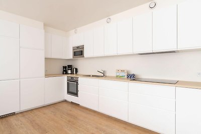 Ruim en luxe appartement in Nes met tuin