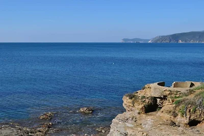 Wohnung in Capoliveri mit Garten