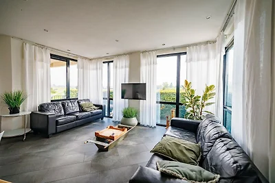 Villa in den Niederlanden mit Hafenblick