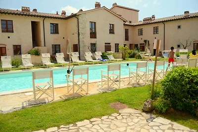 Grazioso appartamento con piscina in comune