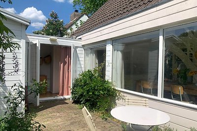 Vakantiewoning met tuin nabij bos, strand en...