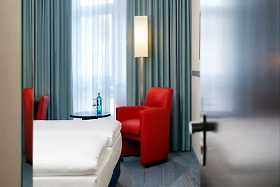 H+ Hotel Köln Brühl by Sunday Hotels Chambre...