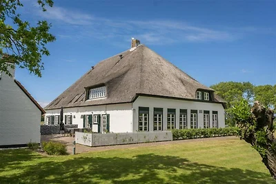 Woonboerderij in De Cocksdorp met tuin