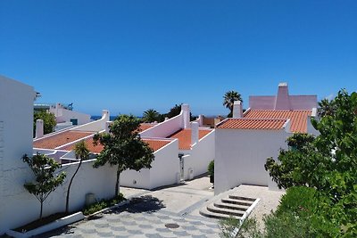 Reihenhaus mit Terrasse innerhalb einer Wohna...