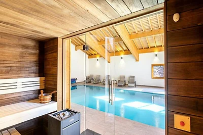 Attico nelle Alpi con Piscina e Jacuzzi