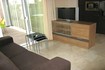 Appartement met uitzicht op het zwembad L'...