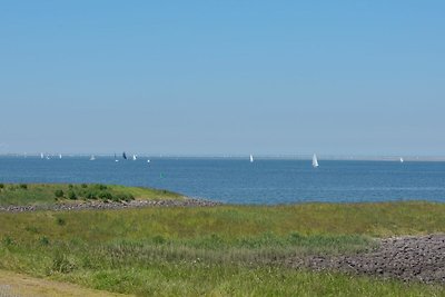 Chalet con camino vicino all'Oosterschelde