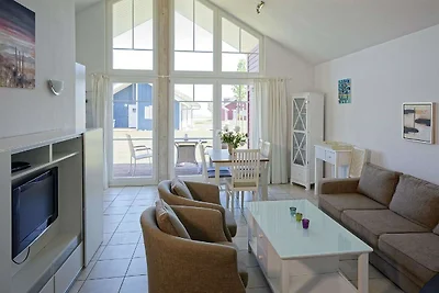 Bungalow moderno con stufa a legna e vista...