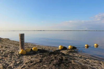 Ferienhaus am Wasser mit Veranda