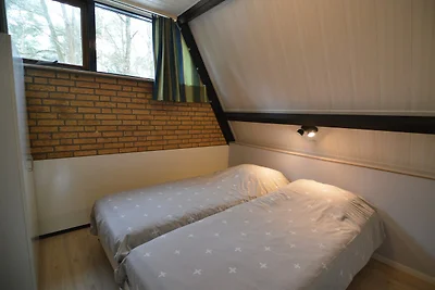 Ferienhaus eines üppigen Waldes in Limburg