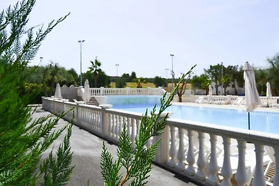 Reihenbungalow in einem Feriendorf Lido del M...
