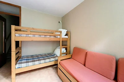 Licht duplex appartement · Aan de voet van de...