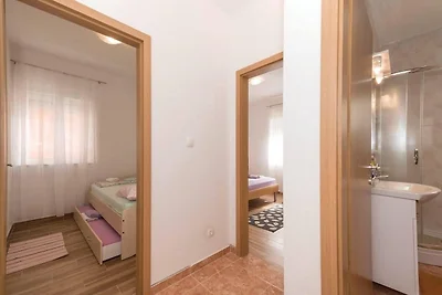 Appartement in Rogoznica, aan het strand
