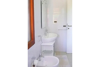Appartamento a Costa Rei con giardino