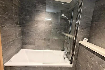 Apartment in den Alpen mit privatem Garten