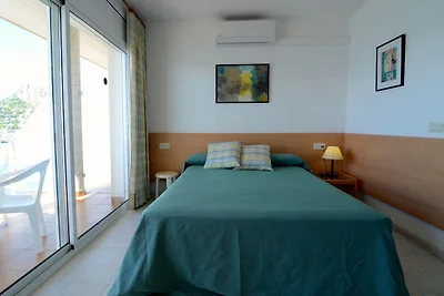 Studio bij Costa Brava Strand met Zwembad
