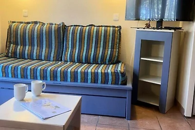 Appartement met zwembad vlakbij uitzicht op h...