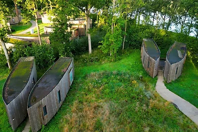 Accogliente cottage nel bosco di Belvilla