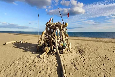 Begane grond appartement aan het strand