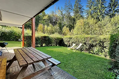 Appartement in Les Carroz met privétuin