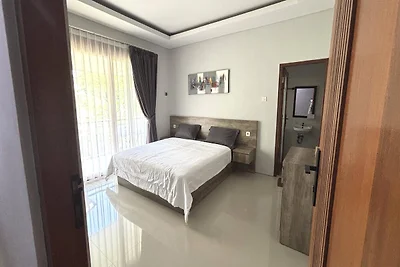 Suite con balcone vicino alla spiaggia di...