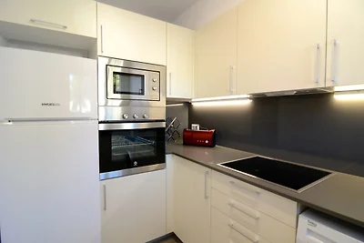 Appartement met 2 kamers en tuin
