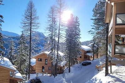 Chalet con vasca idromassaggio sul balcone
