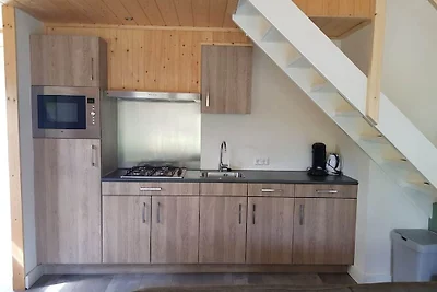 Atmosphärische Lodge mit Terrasse auf der...