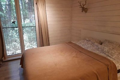 Chalet in una riserva naturale con giardino