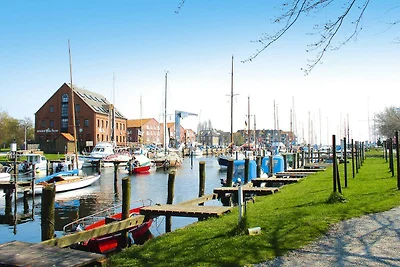 Appartement in Orth bij haven en vuurtoren