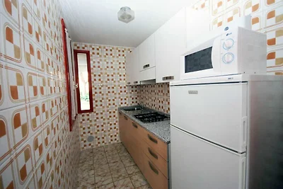 Terraced house with communal pool