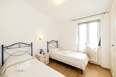 Appartamento con piscina comune