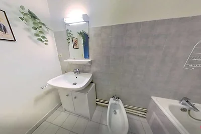 Camera accogliente in un accogliente appartam...