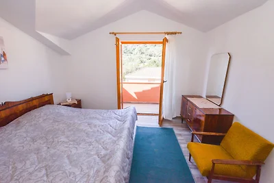 Ferienhaus in Veli Iz mit umzהuntem Garten