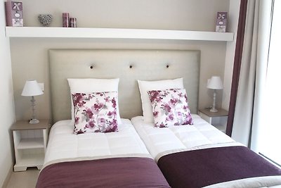 Appartement moderne et confortable près du po...