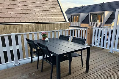 Lodge mit Blick auf die Kirche und die Dünen