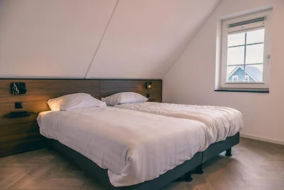 Duurzame watervilla met sauna, bij het...