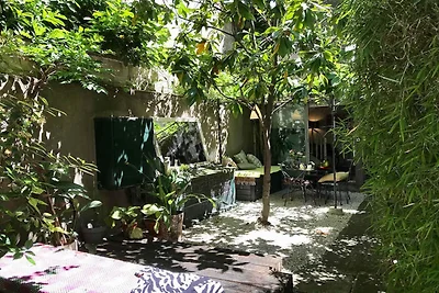 Duplex con giardino privato nel cuore del 15°...