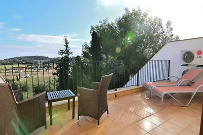 Huis in Muro met uitzicht op de baai van...