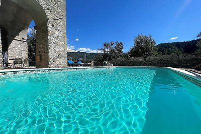 Appartamento con terrazza privata e piscina