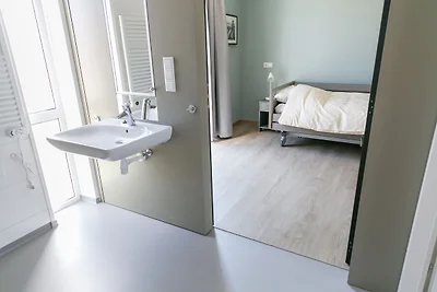 Moderna casa vacanze con giardino d'inverno