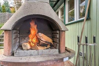 Vakantiehuis met terras direct aan het bos