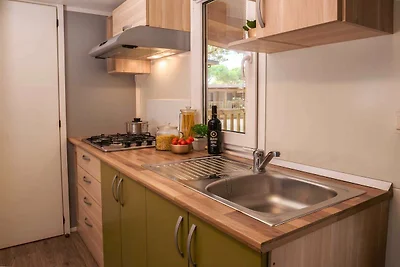 Mobilhome im Ferienpark mit grosser...