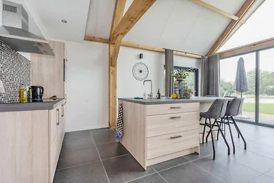 Soggiorno in lodge moderno con vista sullo...