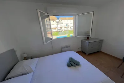 Huis aan het strand met zwembad