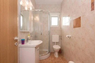 Appartement in Rogoznica, aan het strand