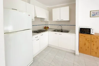Appartamento con piscina e giardino...