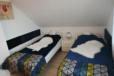 Ferienhaus in Nowe Warpno mit Garten