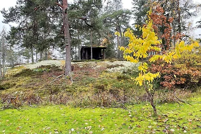 Gemütlicher Rückzugsort im Wald mit Whirlpool