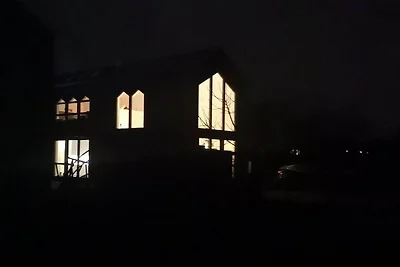 Huis aan de rivier de Werder